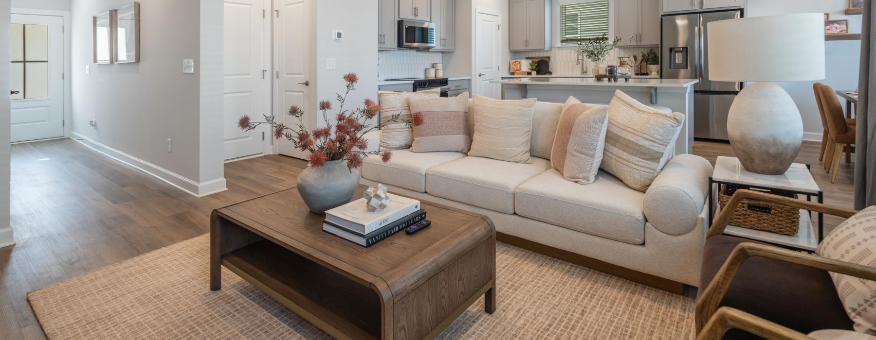 a living room with a couch and a table