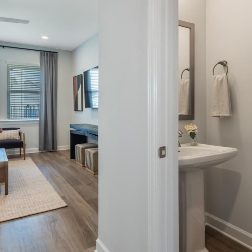 a bathroom with a sink and a couch